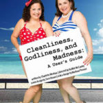 Two women in vintage swimsuits holding a sign about cleanliness, godliness, and madness.